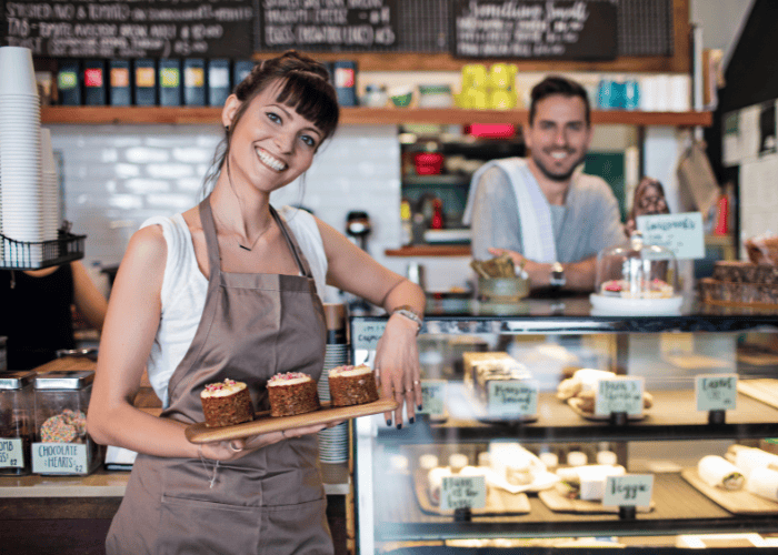 Business owner reviewing chatbot leads on phone