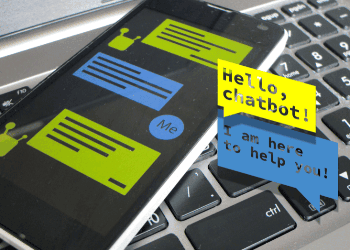 Business owner reviewing chatbot conversations on laptop