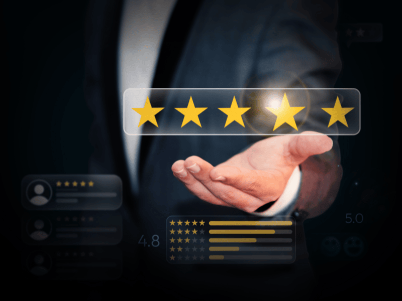 Business owner reading customer reviews on tablet
